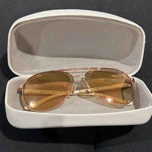 Used Michael Kors shades & case. White. Fair condition.Some scratches on lenses.